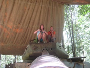 Katie and I climbing on a destroyed American tank. Wee!